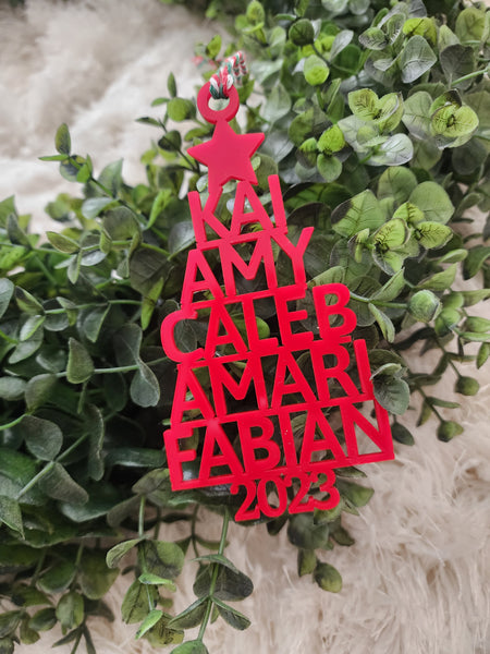 Family Name Christmas tree ornament - A perfect addition to your Christmas tree this holiday season. Personalized with your names, this ornament is made in the shape of a Christmas tree with choice of a topper (snowflake or star)