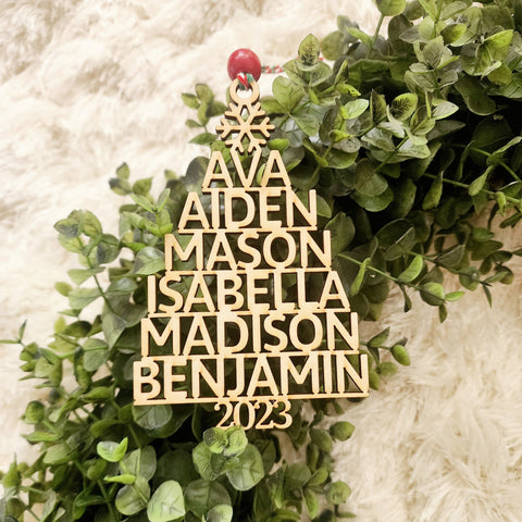Family Name Christmas tree ornament - A perfect addition to your Christmas tree this holiday season. Personalized with your names, this ornament is made in the shape of a Christmas tree with choice of a topper (snowflake or star)