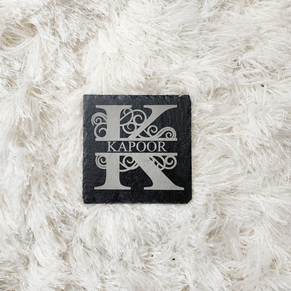 Monogrammed engraved coasters with your initial and last name on it. Beautiful, hand-shaped coasters of natural slate show off their uniquely chiseled edges, providing an earthy and naturally stain-resistant resting place for glasses. Makes great gifts for clients, employees, family and friends.