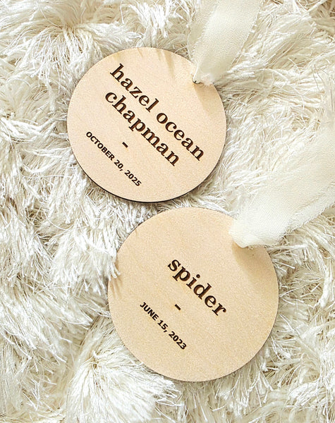 Custom engraved wooden ornament with personalized name and date