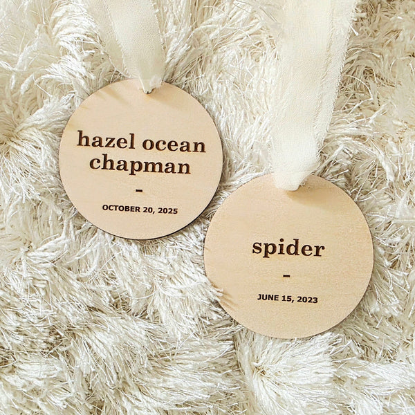 Personalized wooden name and date ornament for newlyweds, newborns and new pets