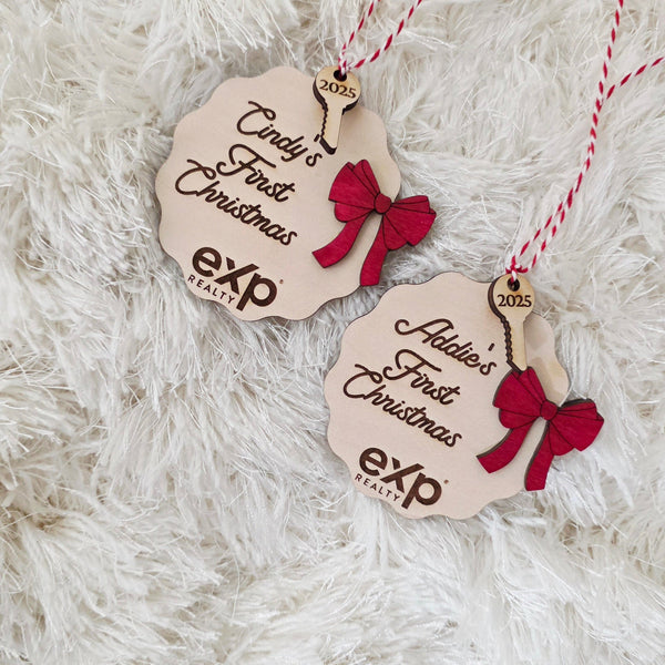 Two scalloped wooden Christmas ornaments with engraved names and the year 2025, each attached to a red-and-white striped string and decorated with a small red bow.